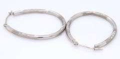 14kt White gold diamond cut hoop earrings
