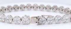 18kt White gold 12.16ctw diamond cluster bracelet