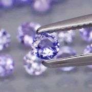 Glittering 3.99ct bright blue violet Tanzanite set