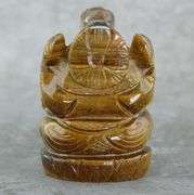 Detailed 477.50ct Tiger Eye carving