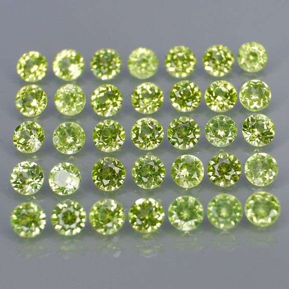 Fantastic 4.39ct 3mm round cut Peridot set
