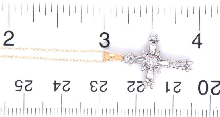 14kt Yellow gold baguette and round diamond cross pendant on chain