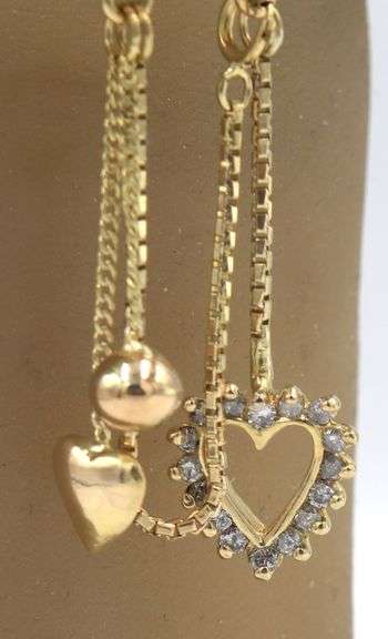 14kt Yellow gold Jade and diamond accent hinged bangle bracelet