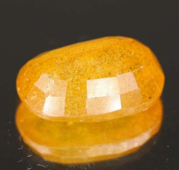 Vibrant 7.96ct golden orange Mozambique Sapphire