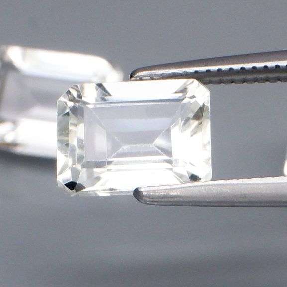 Awesome 5.43ct emerald cut White Topaz set