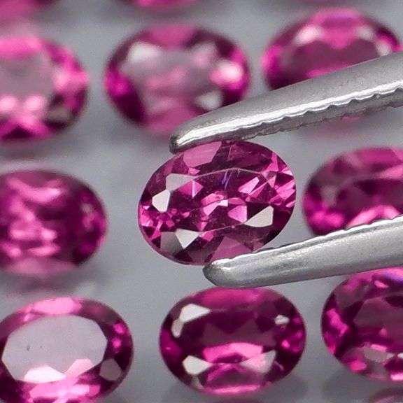 Ravishing 5.39ct violet pink Rhodolite Garnet set