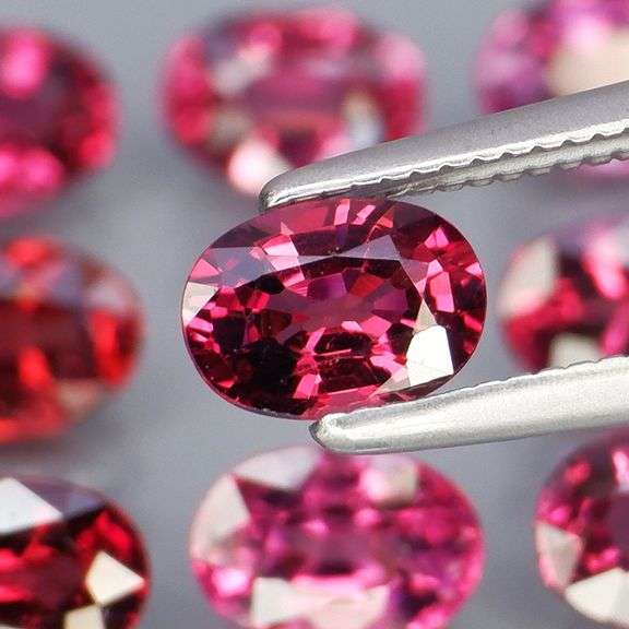 Remarkable 6.34ct violet pink Rhodolite Garnet set