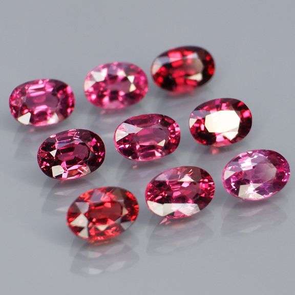 Remarkable 6.34ct violet pink Rhodolite Garnet set