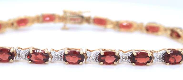 10kt Yellow gold Oval Garnet and diamond tennis bracelet