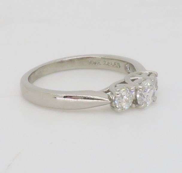 Platinum Three Stone Ring Featuring Octagon Brilliant Cut Diamonds