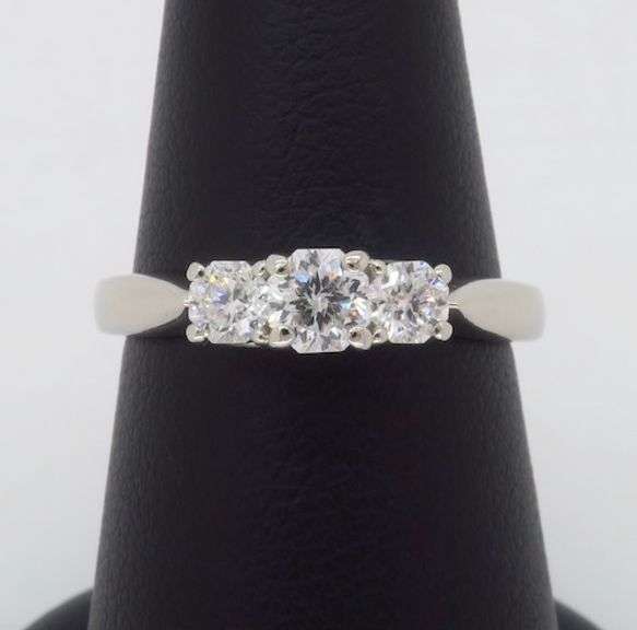 Platinum Three Stone Ring Featuring Octagon Brilliant Cut Diamonds
