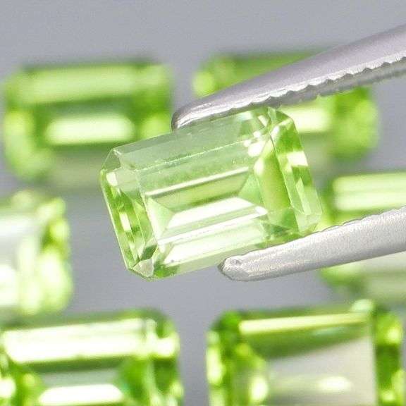 Emerald cut unheated! 4.62ct Peridot set