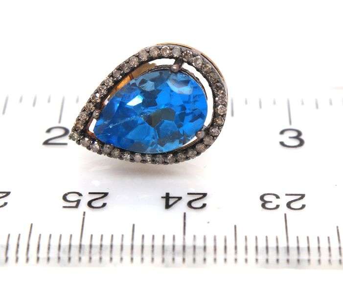 Gorgeous Topaz Teardrop Earrings rimmed with Diamond Accents