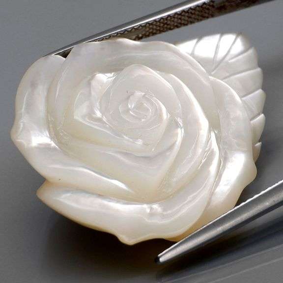 Shimmering 50.23ct flower Mother of Pearl carving