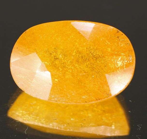 Vibrant 7.96ct golden orange Mozambique Sapphire