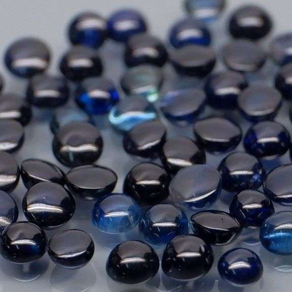 Glistening 5.11ct heated only Sapphire cabochon set