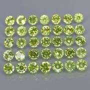 Fantastic 4.39ct 3mm round cut Peridot set