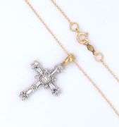 14kt Yellow gold baguette and round diamond cross pendant on chain