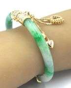 14kt Yellow gold Jade and diamond accent hinged bangle bracelet
