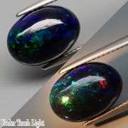 Glistening 2.91ct fiery flashing Welo Black Opal