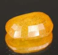 Vibrant 7.96ct golden orange Mozambique Sapphire