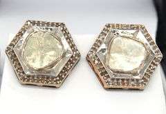 Flashy Silver Earrings Stamped with Mine Cut Diamond and Diamond Accents