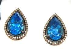 Gorgeous Topaz Teardrop Earrings rimmed with Diamond Accents