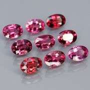 Remarkable 6.34ct violet pink Rhodolite Garnet set