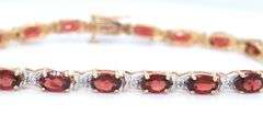 10kt Yellow gold Oval Garnet and diamond tennis bracelet