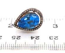 Gorgeous Topaz Teardrop Earrings rimmed with Diamond Accents