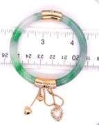 14kt Yellow gold Jade and diamond accent hinged bangle bracelet