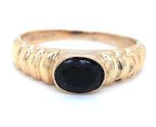 14kt Yellow gold black onyx bezel set twisted ring