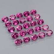 Ravishing 5.39ct violet pink Rhodolite Garnet set