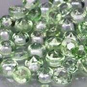 Awesome 5.54ct diamond cut green Sapphire set