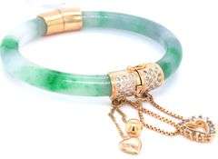14kt Yellow gold Jade and diamond accent hinged bangle bracelet