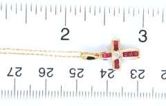 10kt Yellow gold Ruby and diamond accent cross pendant on chain necklace