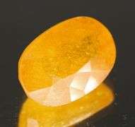 Vibrant 7.96ct golden orange Mozambique Sapphire