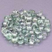 Fantastic 5.18ct diamond cut GREEN Sapphire set