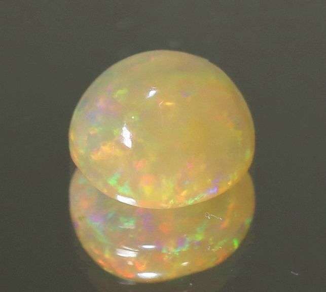 Ravishing 1.37ct unheated disco flashing Welo Opal