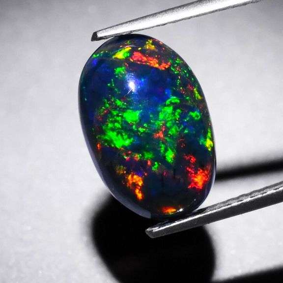 Magnificent 2.19ct full body flashing Black Opal