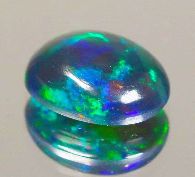 Glowing! 2.16ct full cover multi-pattern black Opal