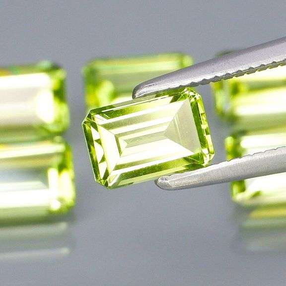 Brilliant 3.92ct 6pc set of matched emerald cut Peridot