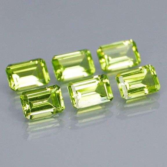 Brilliant 3.92ct 6pc set of matched emerald cut Peridot