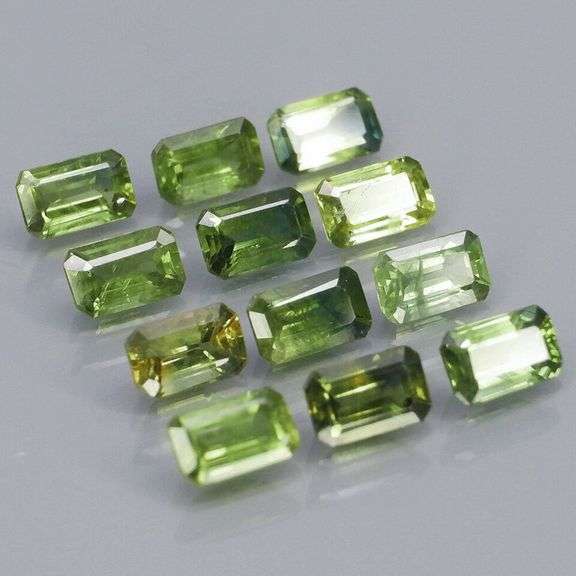 Excellent 4.64ct emerald cut Australian Sapphire set