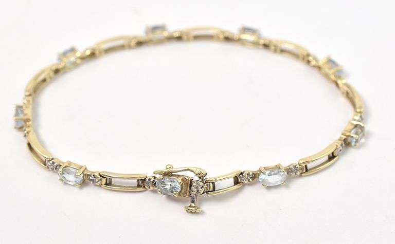 Cute 10K Yellow Gold Aquamarine and Diamond Bracelet