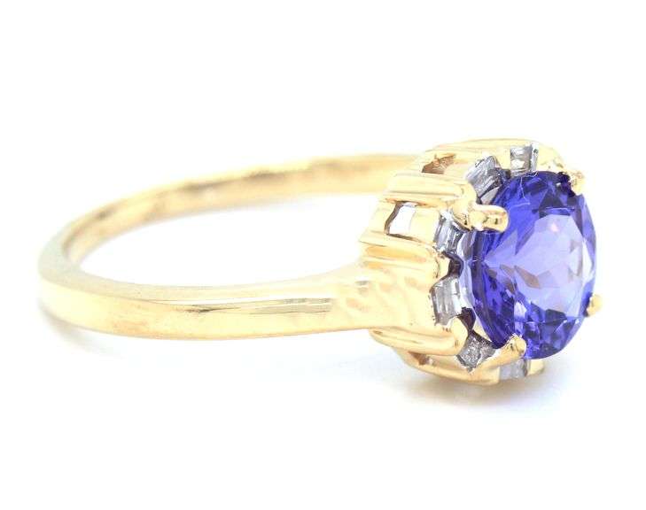 10kt Yellow gold Tanzanite and diamond halo ring