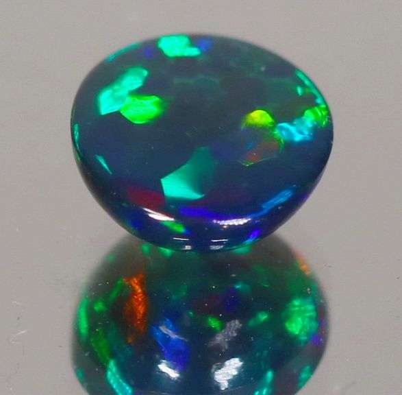 Magnificent 1.24ct blue and green flashing Black Opal