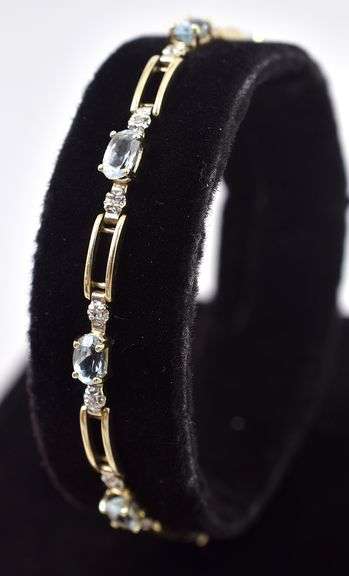 Cute 10K Yellow Gold Aquamarine and Diamond Bracelet