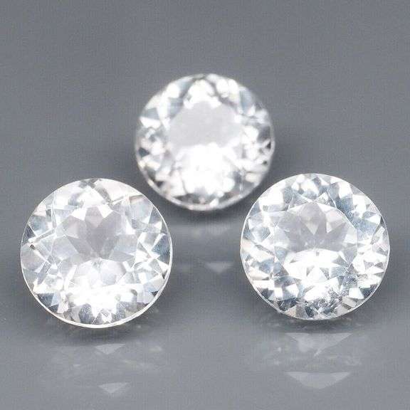 Superb 6.73ct high fire 8mm diamond white Topaz set
