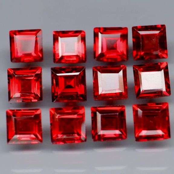 Stunning 6.42ct square cut cherry red Garnet set